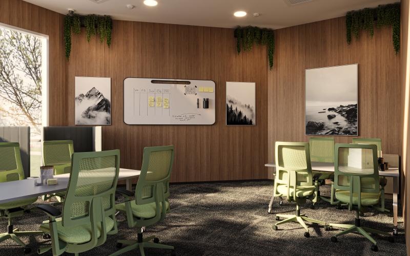 a room with green chairs and a white board with pictures on it